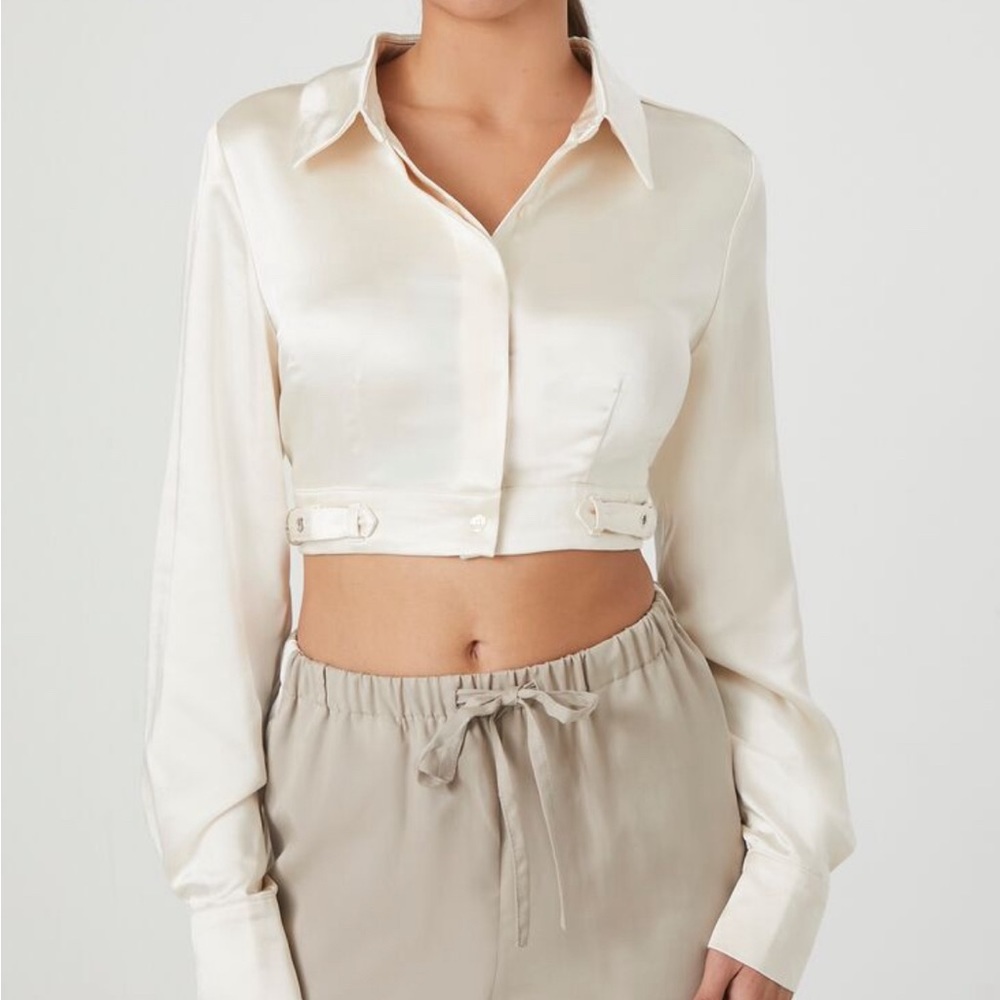 Satin cream cropped hidden button up top.